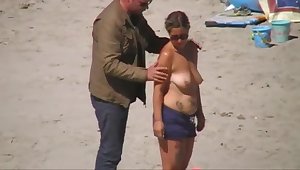 German milf on french beach spy. Out of shape quality.